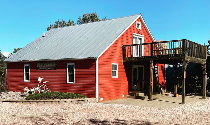 View of side and front of granary lodge